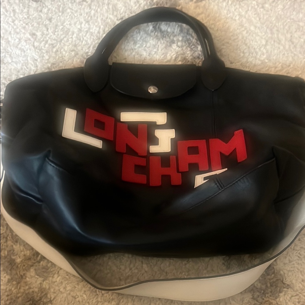 Longchamp Black and Red Duffel Bag Sleek Design